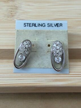 Vintage sterling silver oval post earrings on original card 925